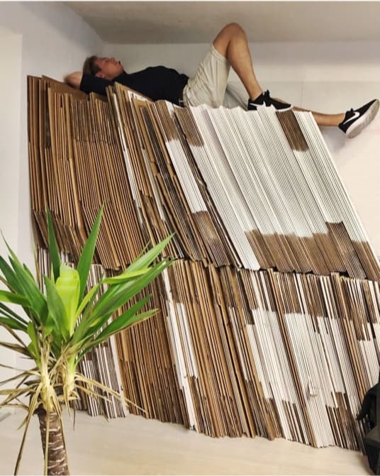 Moving boxes neatly stacked in a corner